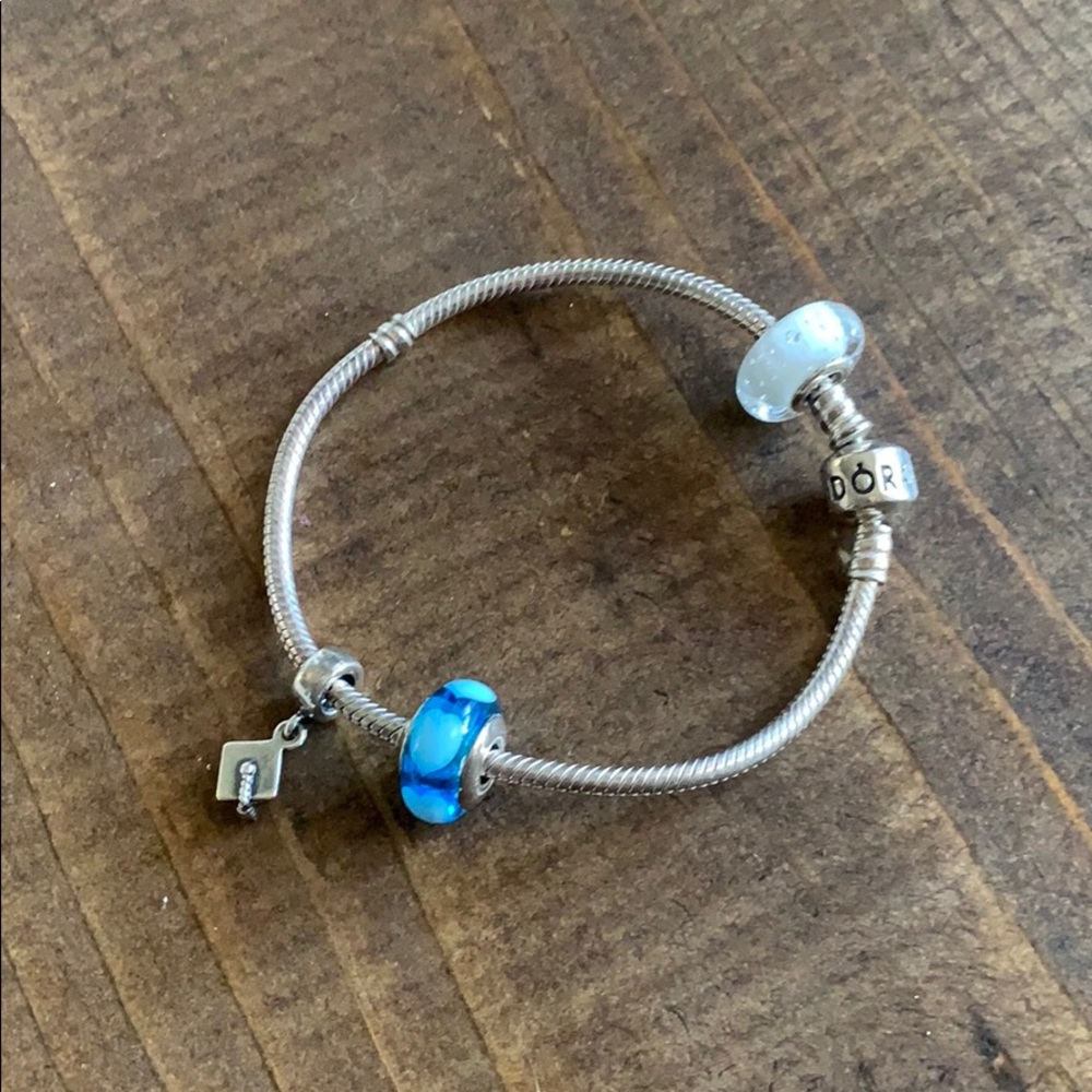 Pandora bracelet with graduation hat charm